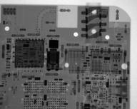 Top-right of lower side of the circuit board