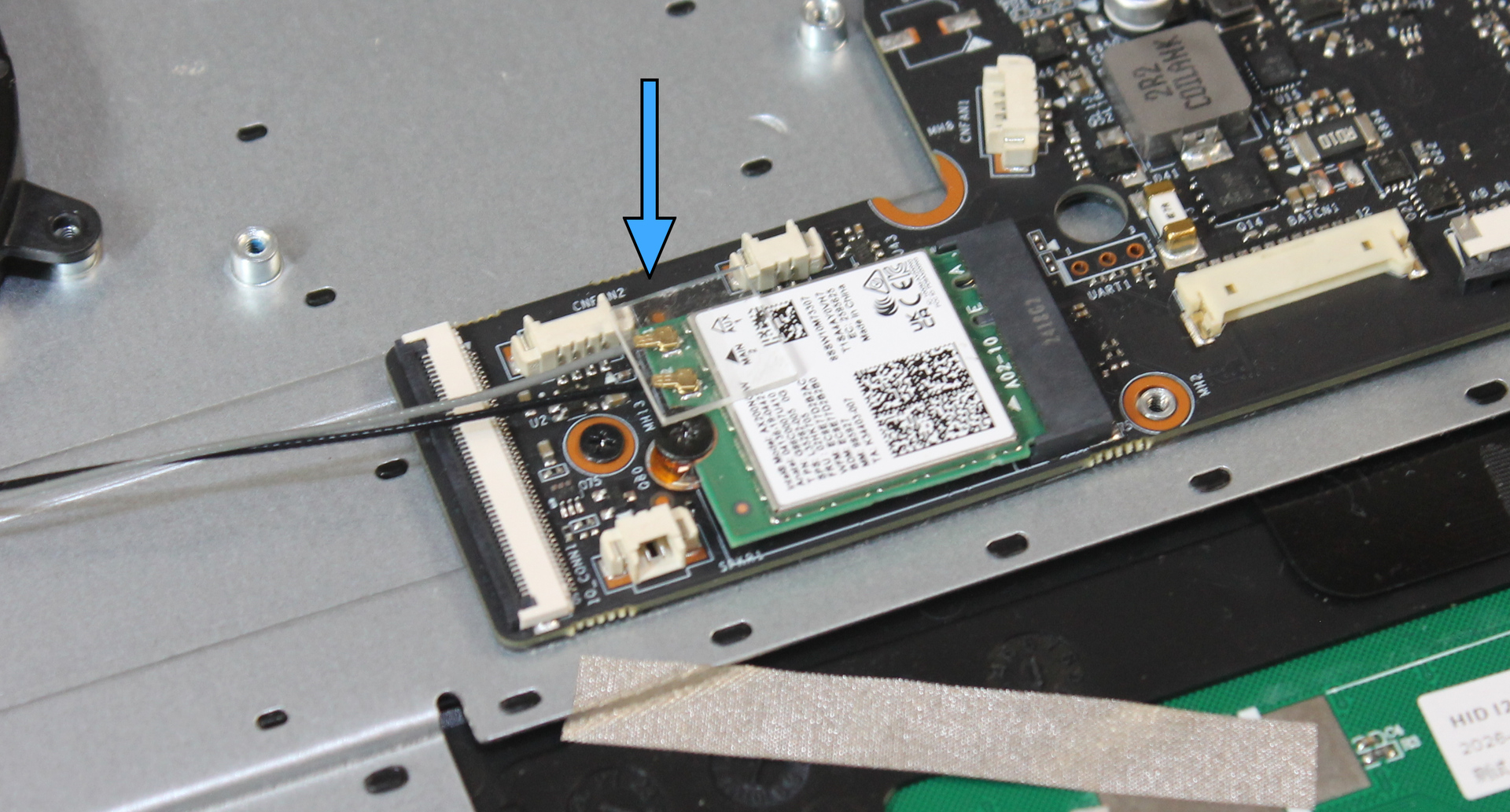 Coaxial cable retainer pressed into place