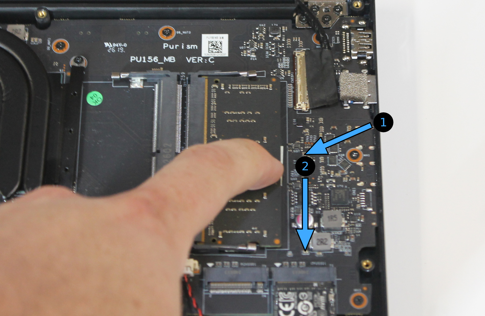 DIMM sockets, with insertion direction marked