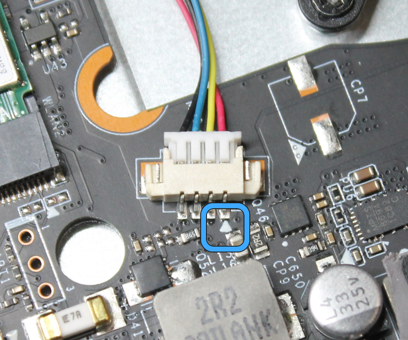 Photo of fan connector on mainboard, with pin 1 indicator marked