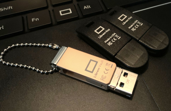 Librem Vault and Keys resting on a Librem 14