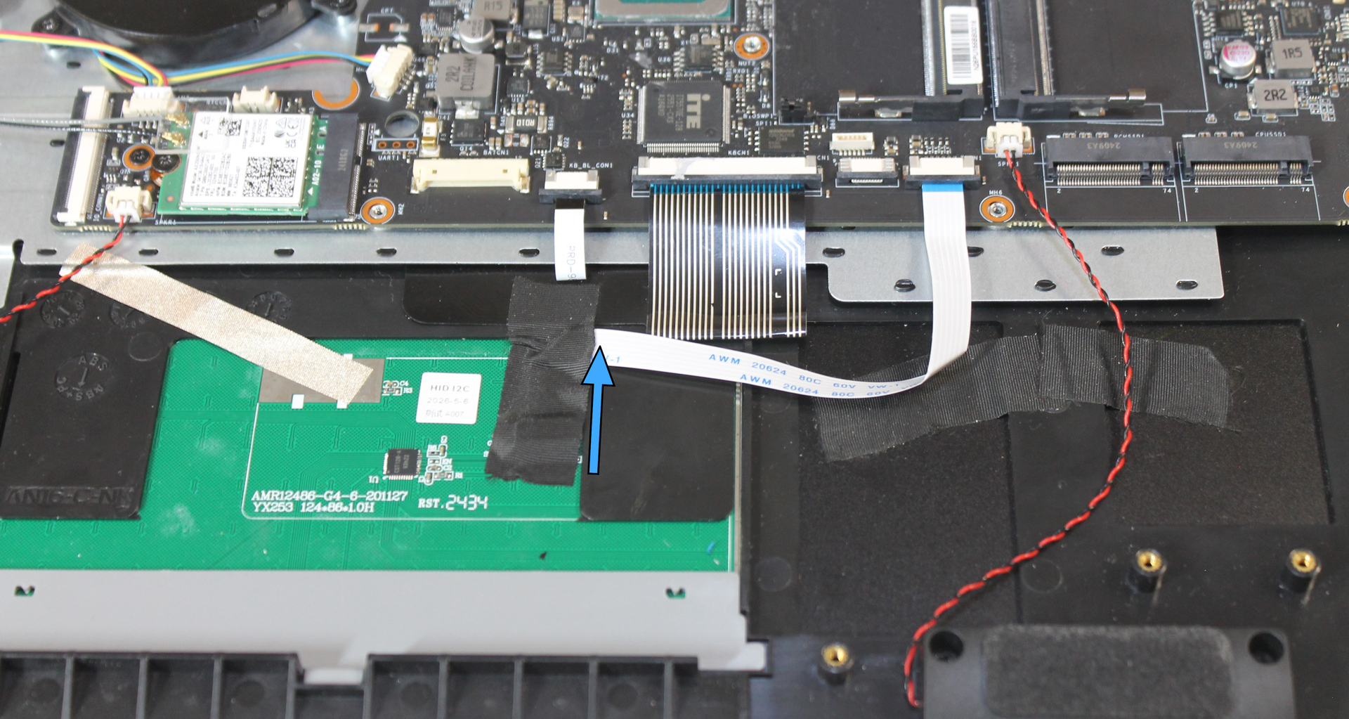 Touchpad cable tape, with direction to remove