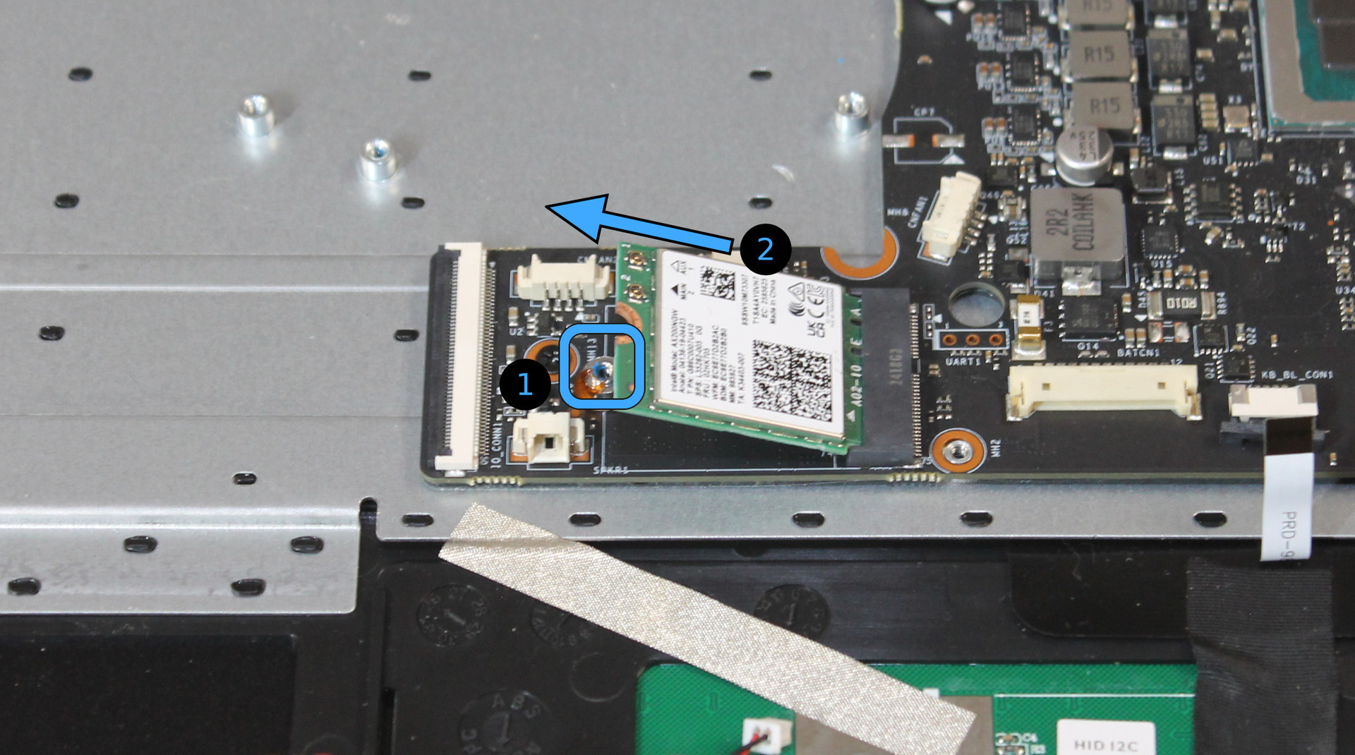 Wireless card screw location and removal direction