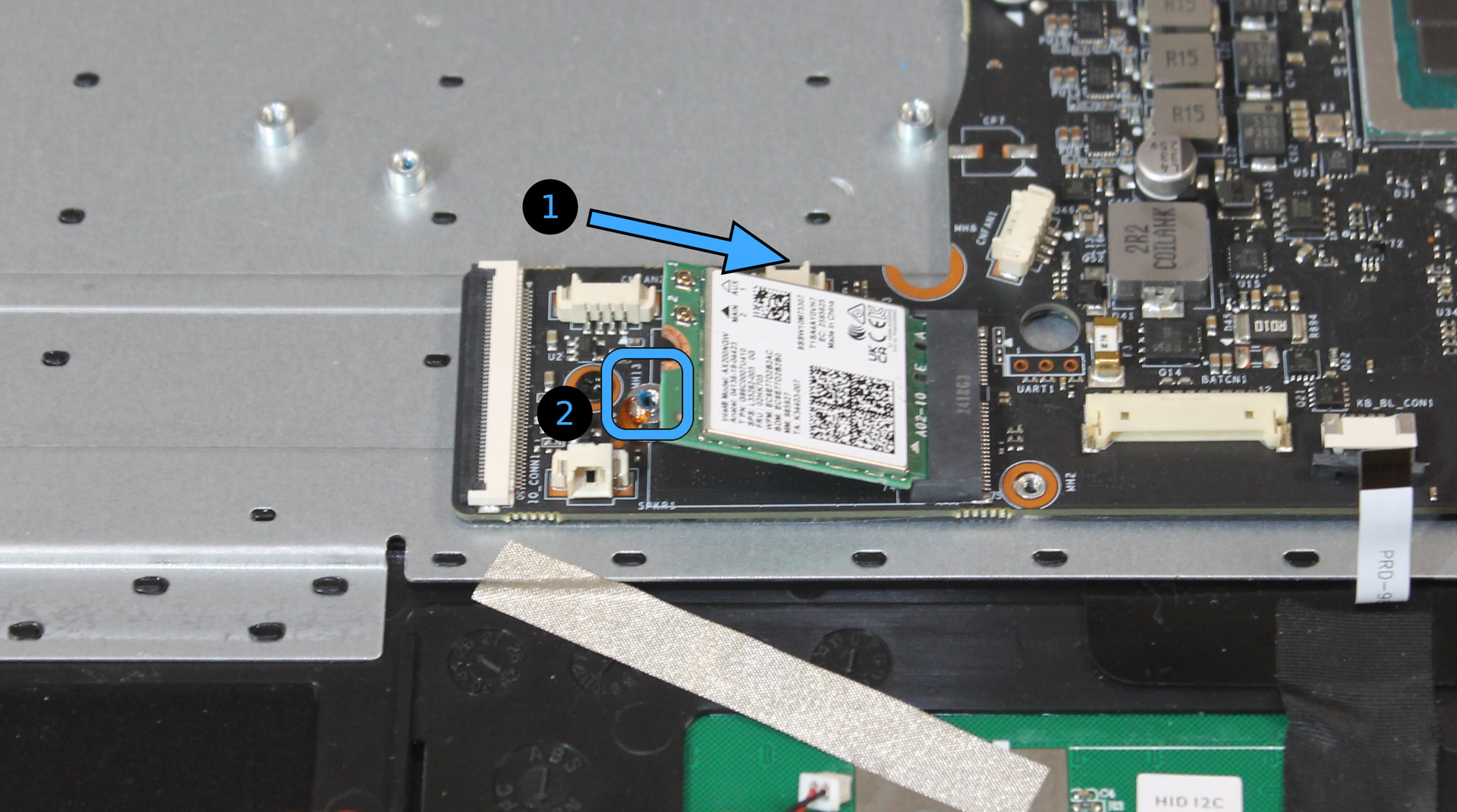 Wireless card insertion direction and screw location
